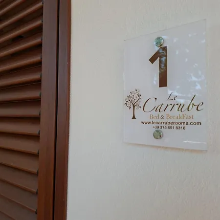 Le Carrube Апартаменты